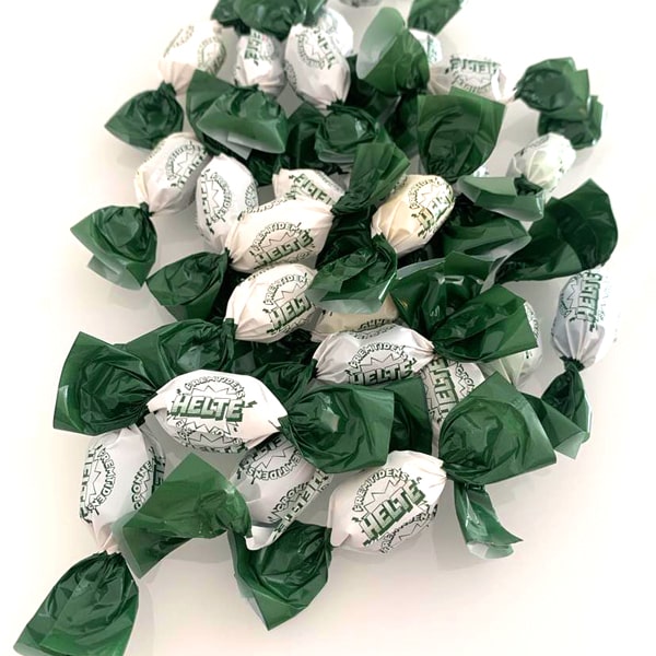 De grønne helte twistede bolsjer med logotryk